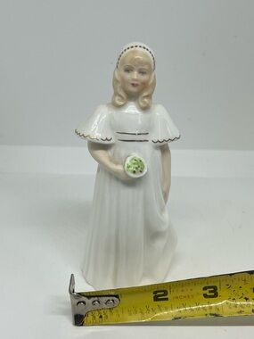 Royal Doulton White Porcelain Girl Figurine with Gold Trim and Green Bouquet